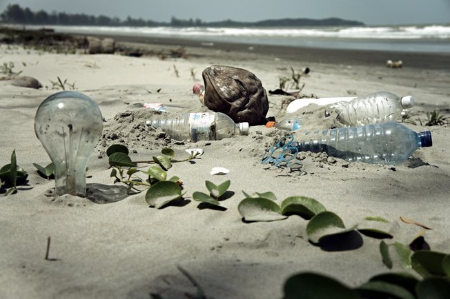 Desktop water pollution with trash disposal of waste at the garbage beach