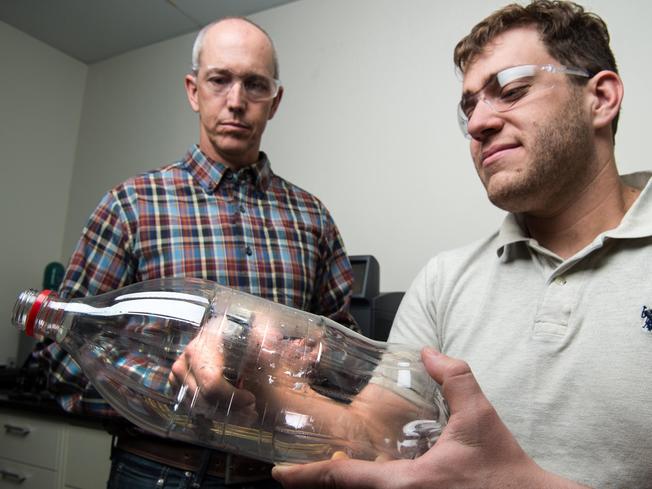 Desktop scientists plastic bottle