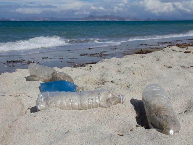Desktop plastic bottles beach